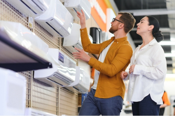 couple choosing air conditioner system for the house