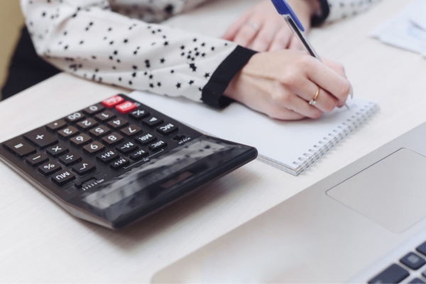 woman computing home propane consumption