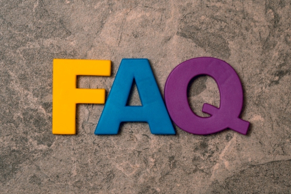 FAQ spelled using colored 3D letters depicting questions about Forced Air vs Hydronic Heating Systems