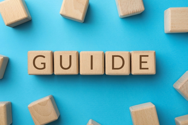 GUIDE spelled using wooden letter cubes depicting Choosing the Right Home Heating Solution