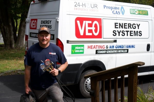VEO Energy Systems professional HVAC technician and service van