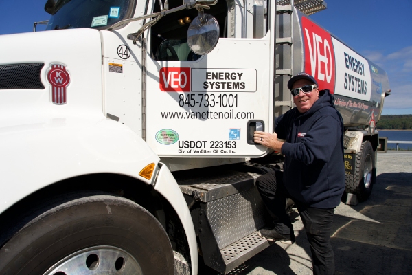 VEO Energy Systems heating oil truck and delivery personnel