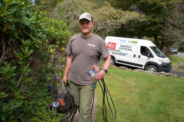 VEO Energy Systems professional HVAC service technician and van