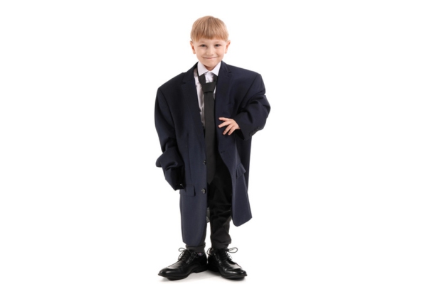 little kid wearing big clothes and shoes depicting Oversized AC Units