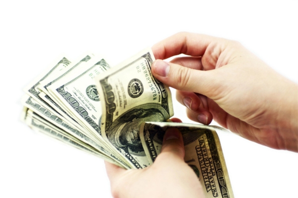 man counting money